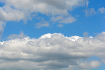 Naklejka na ściany i meble Clouds with blue sky in summer season
