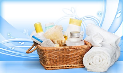 Bath towel and basket with accessories for spa on blur
