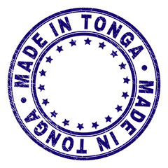 MADE IN TONGA stamp seal imprint with grunge texture. Designed with round shapes and stars. Blue vector rubber print of MADE IN TONGA title with unclean texture.