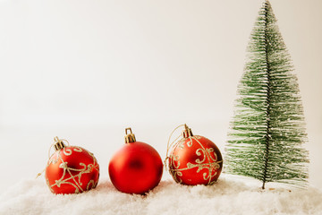 christmas tree and decorative balls with snow, christmas background