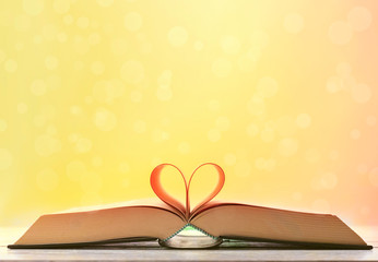 heart shaped book on bokeh background