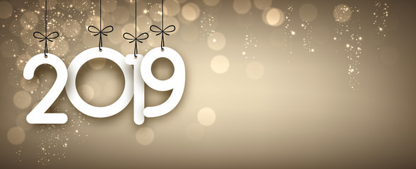 Golden shiny 2019 New Year banner. Bokeh effect.