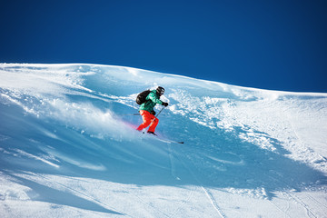 Naklejka na ściany i meble Skier downhill backcountry ski freeride
