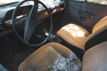 old ruisty car on road © wolfdizz