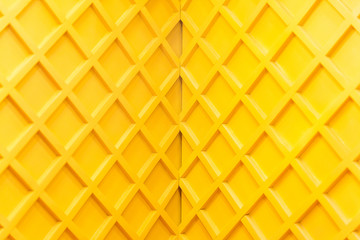 Texture of yellow wooden wall. Designed interior in the room