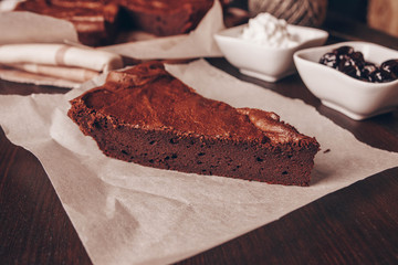 a slice of brownie pie, cherry jam