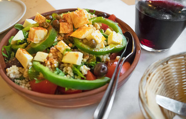 Farm salad with fresh vegetables and cheese.