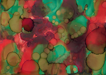 Colorful alcohol ink texture with abstract washes and paint stains on the white paper background.