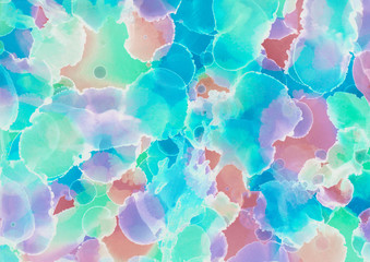 Colorful alcohol ink texture with abstract washes and paint stains on the white paper background.