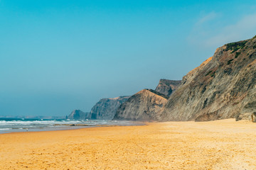 Summer Ocean Beach And Mountains Landscape In Portugal