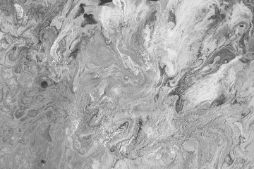 Acrylic abstract background with waves and strokes on white paper background. Trendy look. Chaotic abstract organic design.