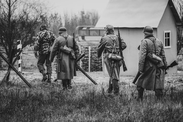 Four German soldiers in full gear