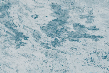 Acrylic abstract background with waves and strokes on white paper background. Trendy look. Chaotic abstract organic design.