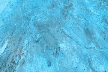 Acrylic abstract background with waves and strokes on white paper background. Trendy look. Chaotic abstract organic design.