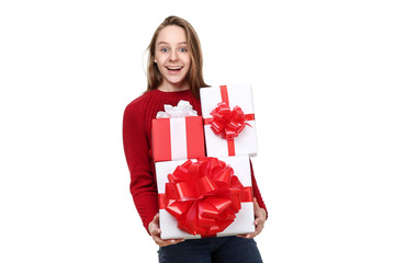 Fototapeta premium Young girl with gift boxes isolated on white background