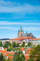 The beautiful landscape of the old town and the Hradcany (Prague Castle) with St. Vitus Cathedral...