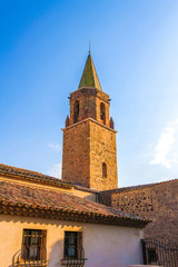 Obraz premium View on the bell tower of the Frejus Cathedral on a sunny day.