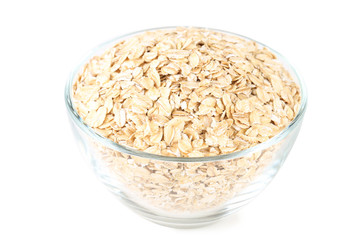 Oatmeal in bowl isolated on white background
