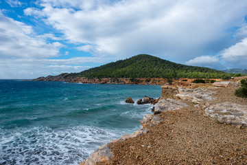 Fototapeta na wymiar The coast in cala sa caleta of Ibiza, baleares