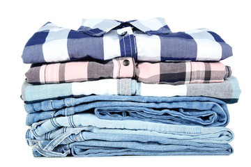 Stack of folded clothes isolated on white background