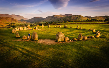 Castlerigg stone circle standing stones lake district sunset blue and green