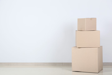 Cardboard boxes on grey background