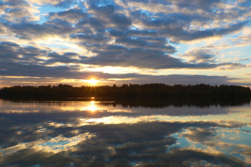 Reflect of lake when sunset with blue sky.