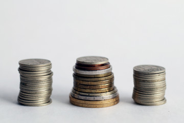 Stack of coins isolated on white background.