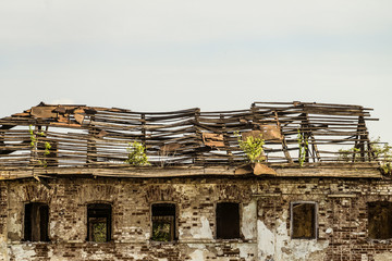 Old damaged rafter roof abandoned dilapidated residential building