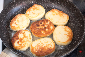 fried side cards, card pancakes fried in a pan. Horizontal photo format