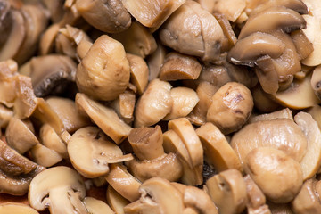 Cut mushrooms. Background from the cut slices of mushrooms