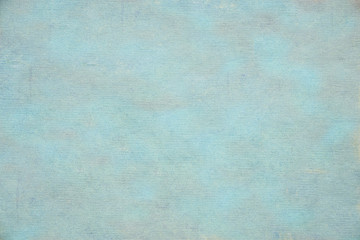 Rugged wrinkled blue paper background