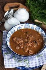 Goulash soup with pork and mushrooms.