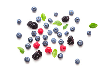blueberry, raspberry and blackberry isolated on white background