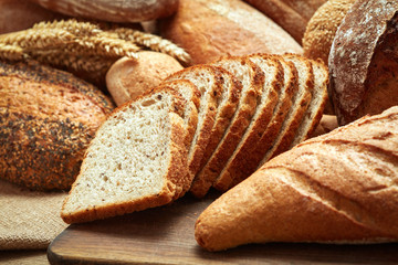 fresh baked bread on wooden background