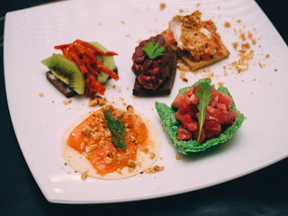 Snacks tacos on the bar table in cafe