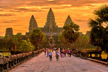 Fototapeta premium SIEM REAP, CAMBODIA - 13 December 2014:View of Angkor Wat at sunrise, Archaeological Park in Siem Reap, Cambodia UNESCO World Heritage Site