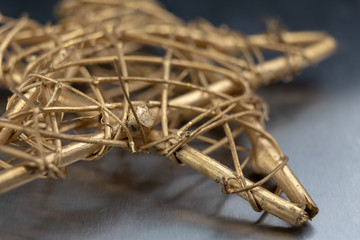 Christmas decorations on the kitchen table. Wooden Christmas figurines prepared for decorating a tree.
