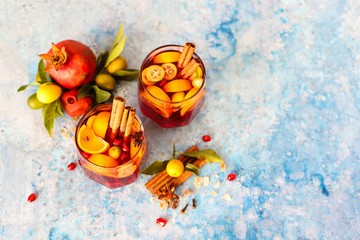 Sangria pomegranate, pear, orange, kumquat and spices, cinnamon, cloves, star anise.