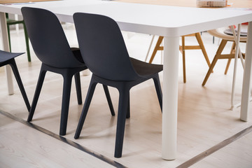 The black chairs close-up at home interior.