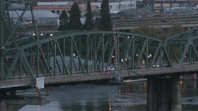 PORTLAND, OREGON, on Dec 20th: Hawthorne Bridge in Portland on Dec 20th, 2016. Hawthorne bridge spans the Willamette river in Portland, Oregon.