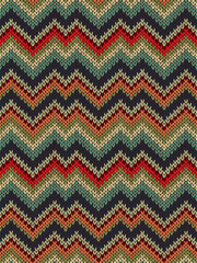 Multicolor seamless knit pattern. Zigzag embroidery texture