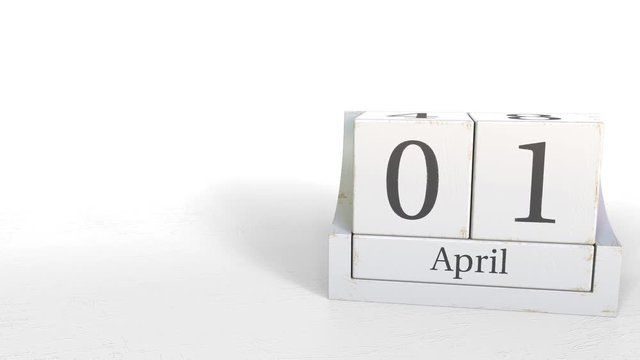 April 1 date on wooden blocks calendar. 3D animation
