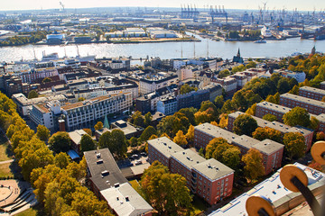 Fototapeta premium City streets of Germany. Panoramic view of the city of Hamburg from a height. Photo of Hamburg from a height. Cityscape houses and streets.
