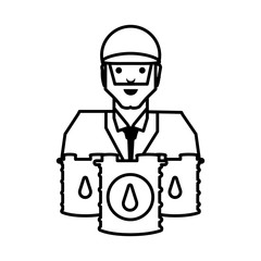 worker with pile barrels of gasoline