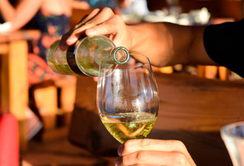 White Wine Being Poured in the Sunshine - Stari Grad, Croatia