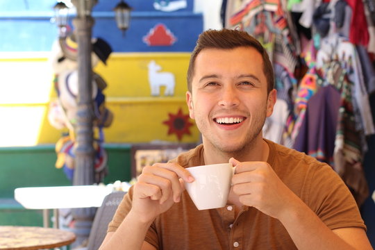 Ethnic man loving his cup of coffee 