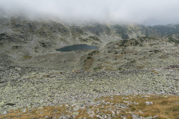 Landscape with fog over Musalenski lakes,  Rila mountain, Bulgaria