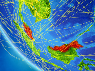 Malaysia on planet Earth from space with network. Concept of international communication, technology and travel.