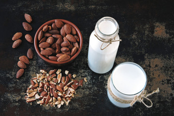 Raw almonds and almond milk. Vegan drink.